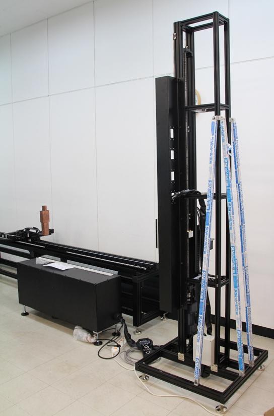 Fresnel Factory Scaled Performance Test machine: a 5-axis CNC automated PIR detector measurement system with a movable scaled human dummy.